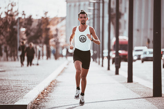 Healthy-looking man running and smiling