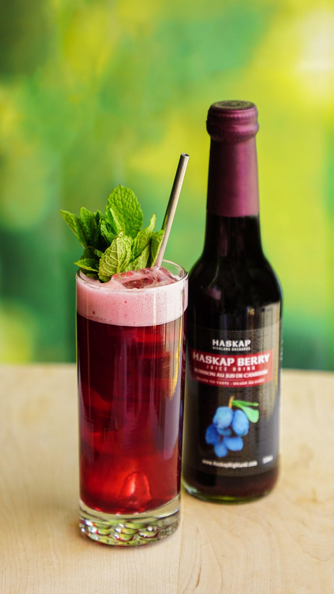 Haskap Garden health mocktail in highball glass with Haskap berry juice